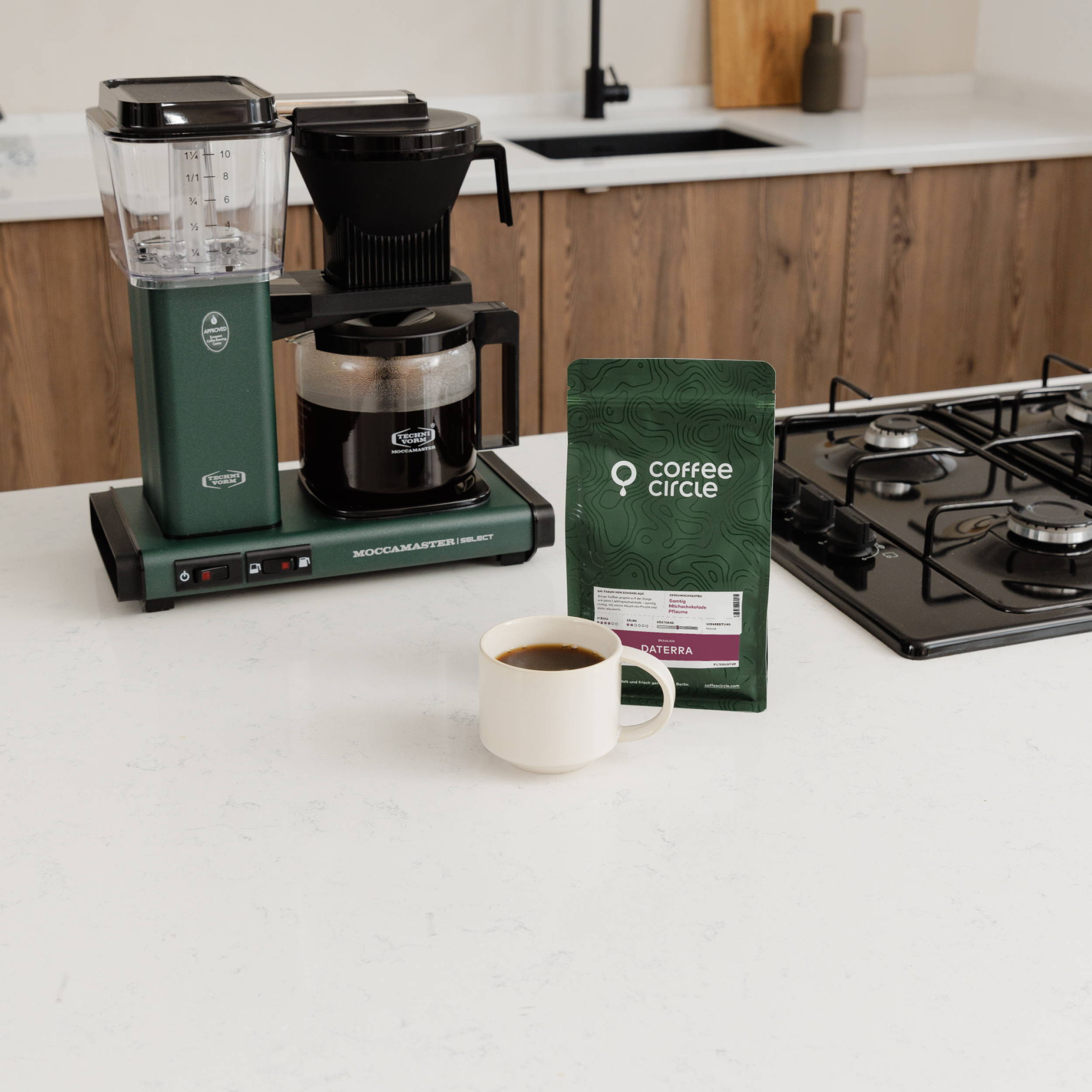 Daterra next to a Moccamaster Coffee Machine