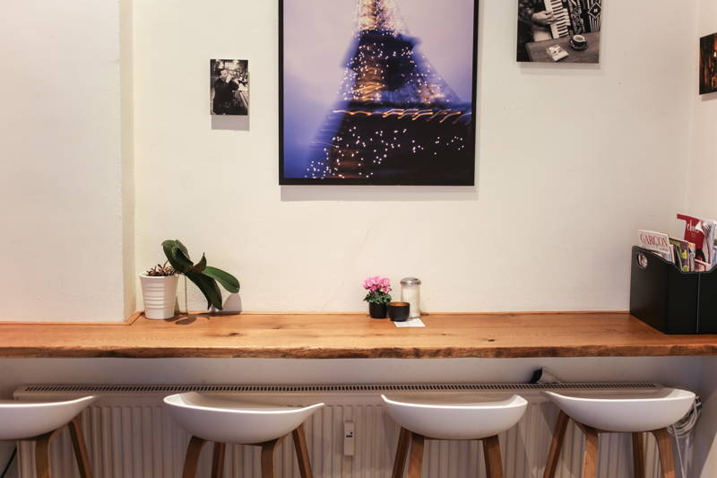 Die Bilder im Café du Bonheur