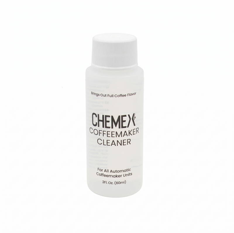 Eine kleine, halbtransparente Kunststoffflasche des Kaffeemaschinen-Reinigers „Chemex Coffeemaker Cleaner“ (60 ml / 2 Fl. Oz.) mit weißem Schraubverschluss, zentral platziert vor einem rein weißen Hintergrund.
