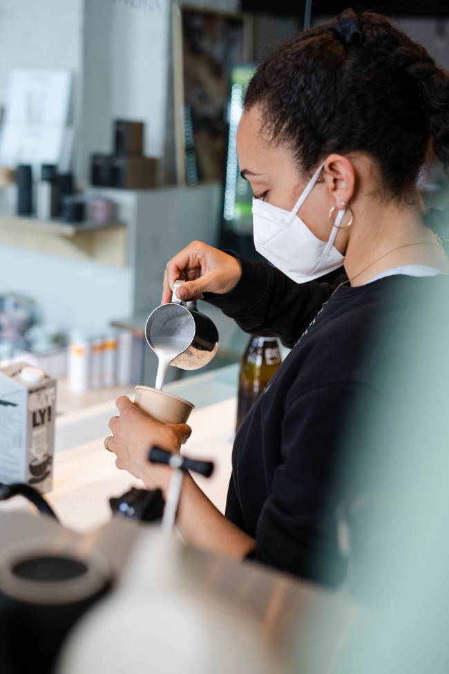 Jasmine making coffee