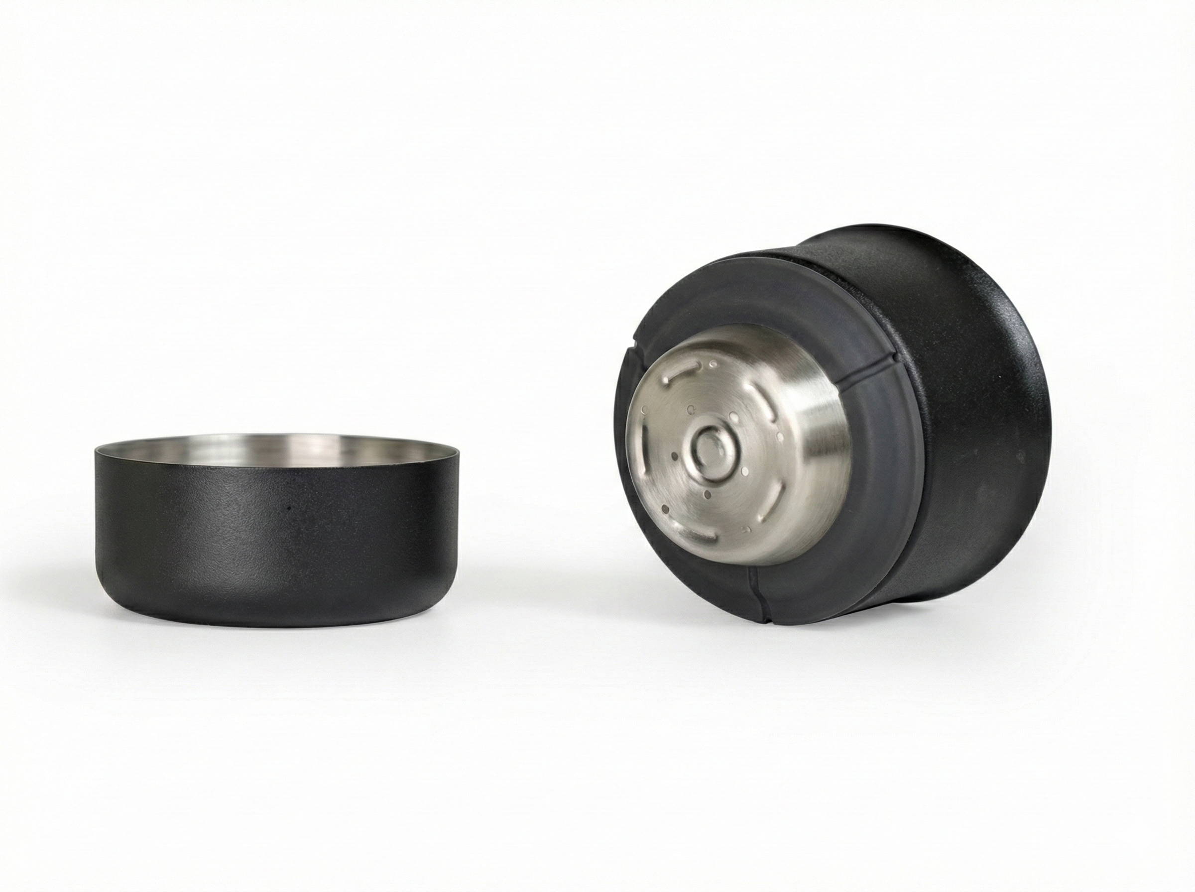 Fellow Stagg X Pour Over Dripper with vacuum-insulated housing and practical drip cup in black.