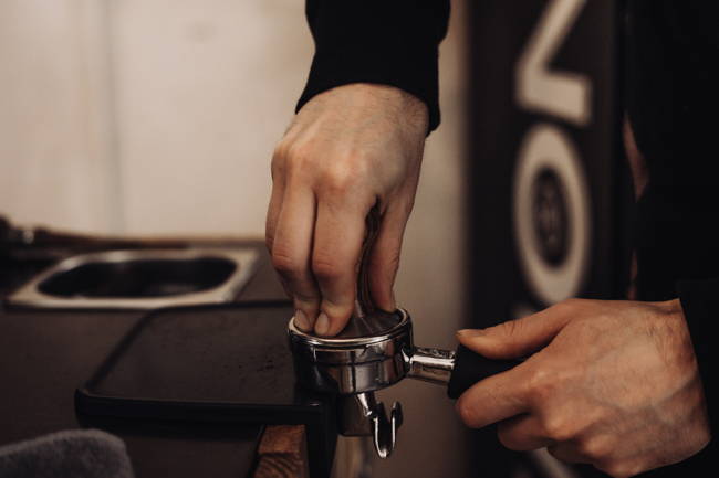 Das Tampen Wichtig für guten Espresso